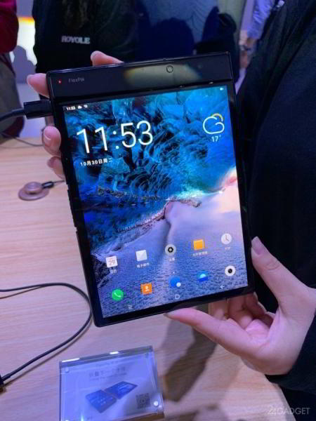 Выпущен первый в мире гибкий гаджет. Производитель не Samsung (7 фото + видео) Выпущен первый в мире гибкий гаджет. Производитель не Samsung (7 фото + видео)