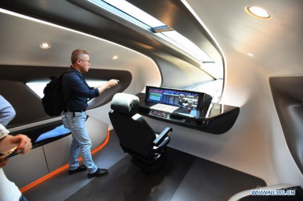 В Китае построили поезд-маглев, развивающий скорость 600 км/ч (9 фото) В Китае построили поезд-маглев, развивающий скорость 600 км/ч (9 фото)