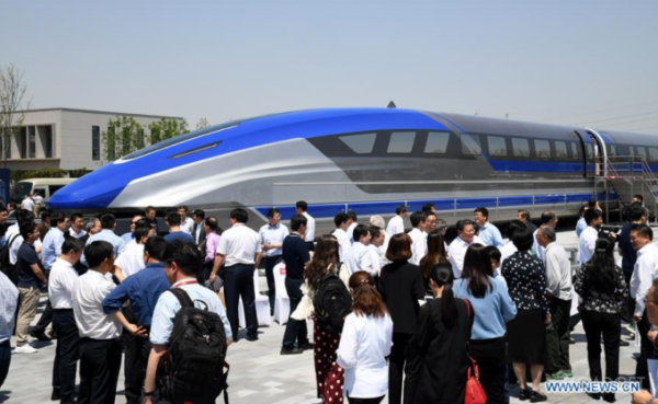 В Китае построили поезд-маглев, развивающий скорость 600 км/ч (9 фото) В Китае построили поезд-маглев, развивающий скорость 600 км/ч (9 фото)