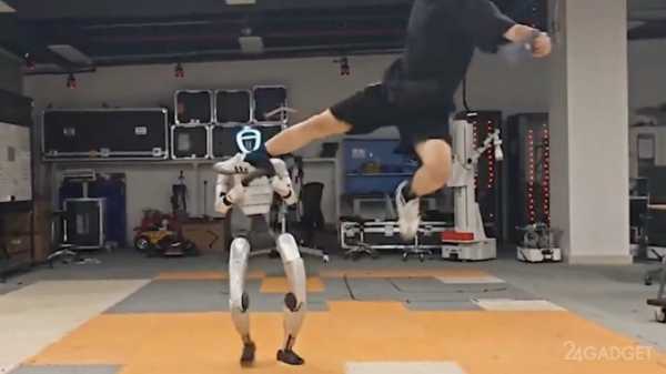 Робот Unitree G1 выдержал поединок по кикбоксингу (3 фото) Робот Unitree G1 выдержал поединок по кикбоксингу (3 фото)